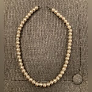 Gold tinged plastic pearl necklace women’s jewelry